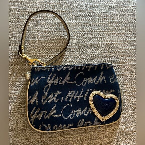 Coach Handbags - Coach navy and gold New York wristlet